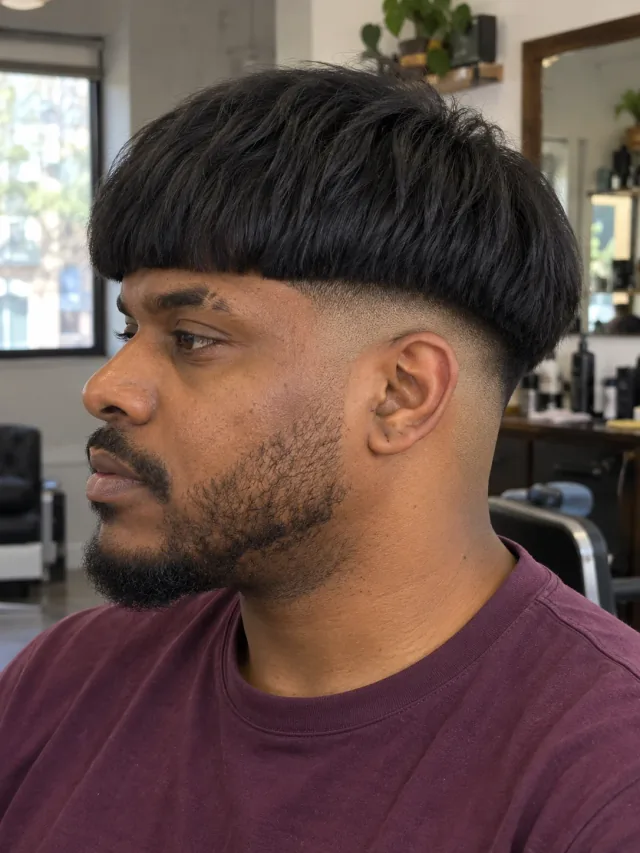 AI concept: low drop fade with a heavy bowl fringe, left-side near-profile view.