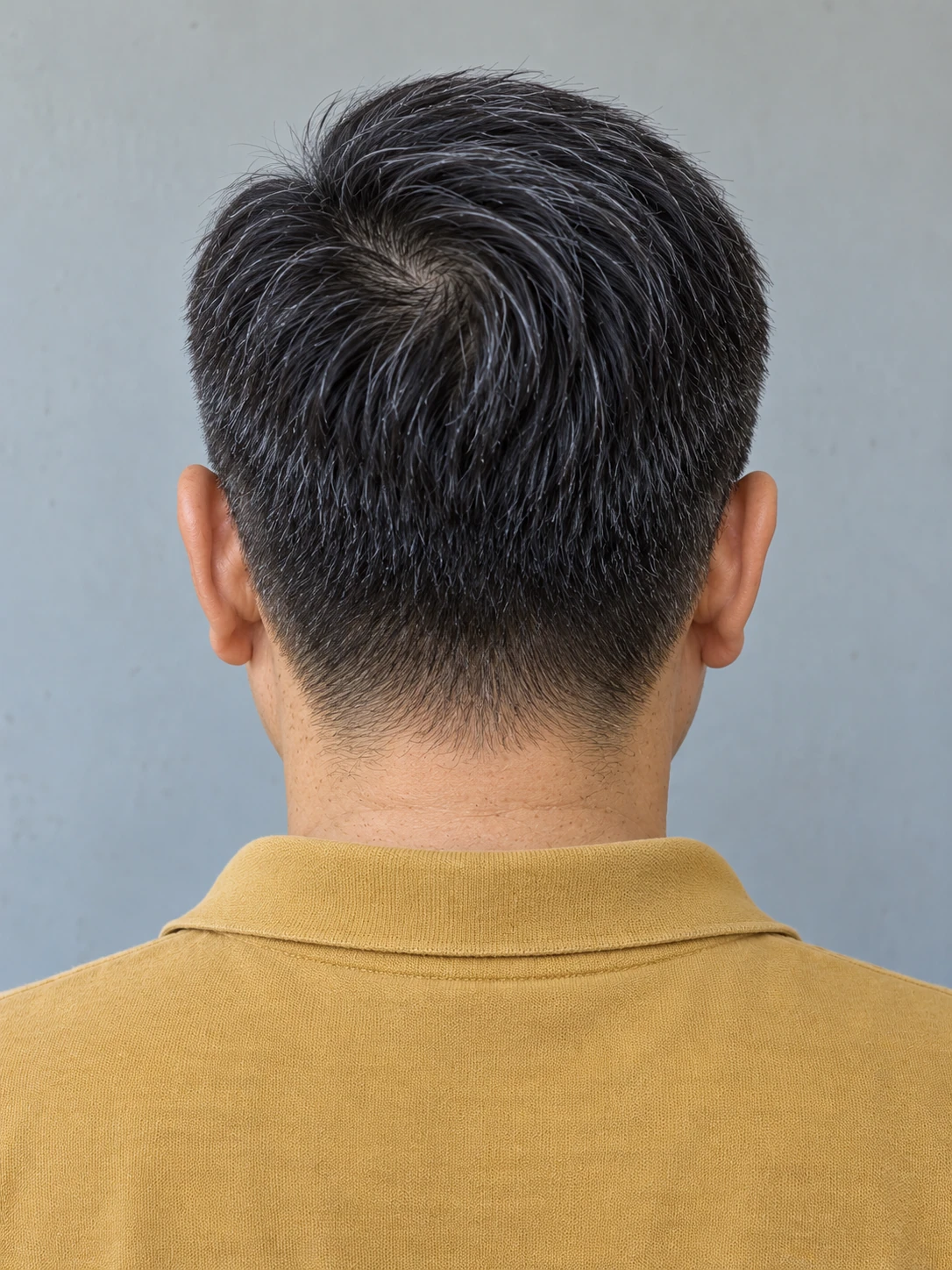 AI concept: side-directed straight Ivy League with a low taper, rear view.