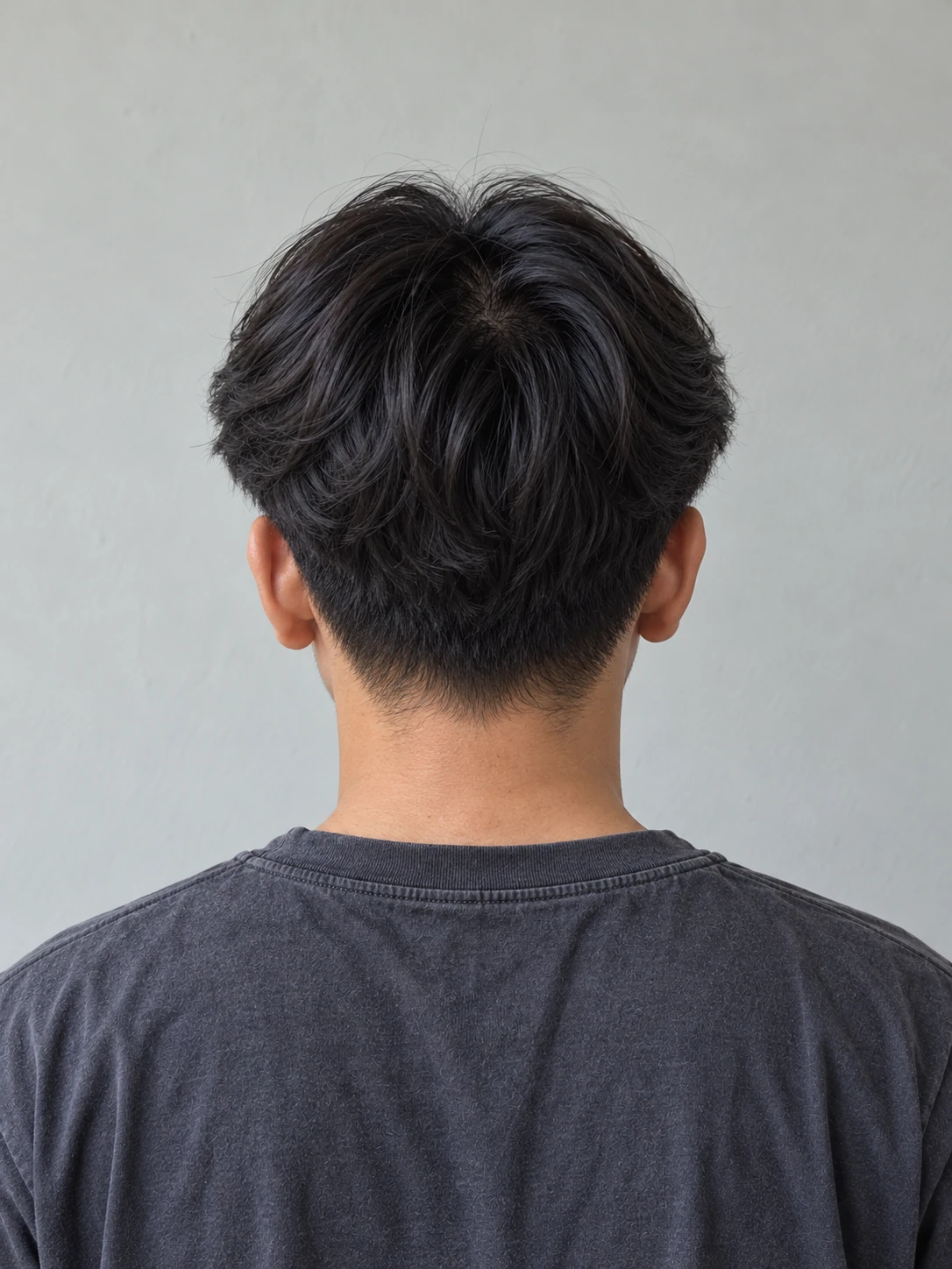 AI concept: straight centre-parted curtains with a low taper, rear view.