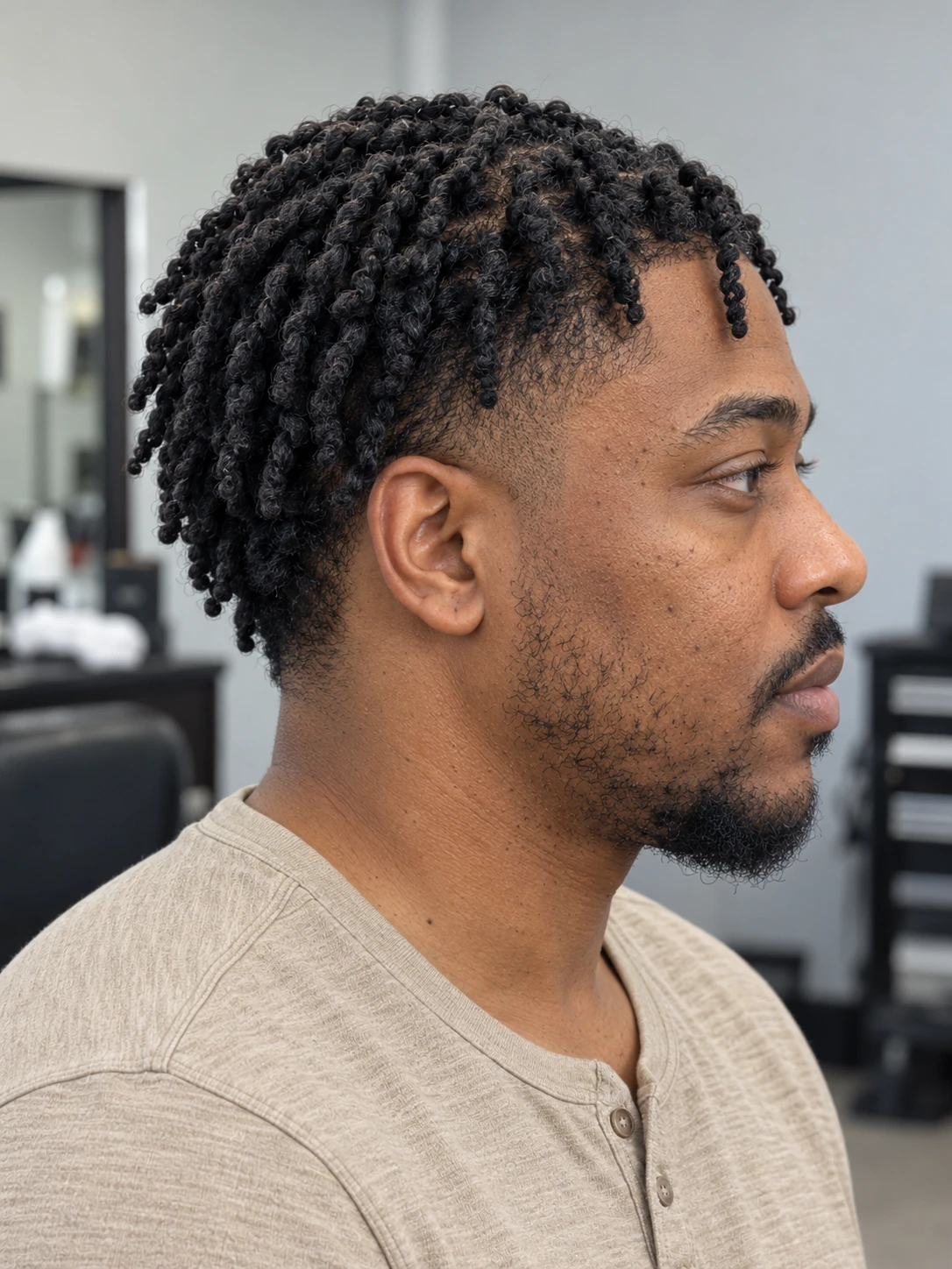 AI concept: defined coily twist top with a low taper, right-side view.