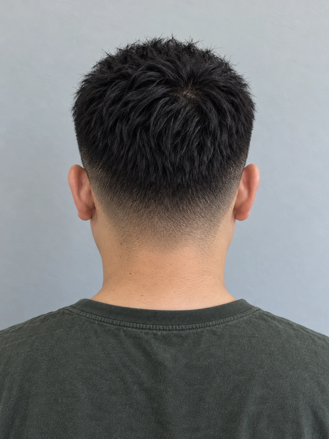 AI concept: short straight blunt crop with a high taper, rear view.