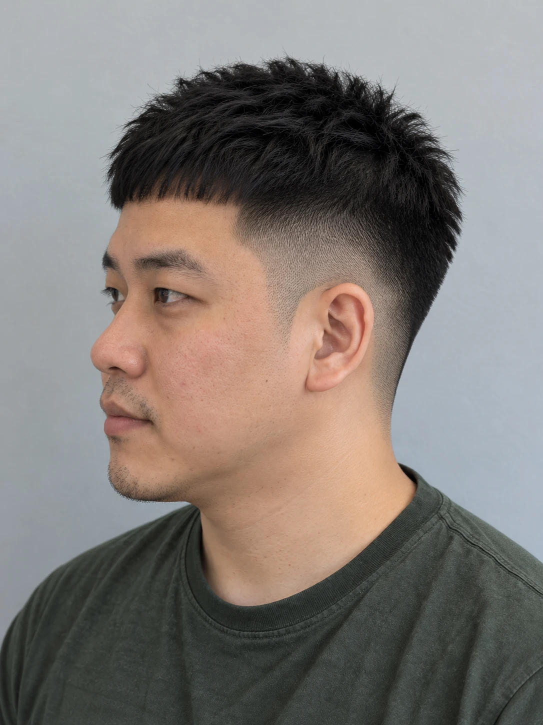 AI concept: short straight blunt crop with a high taper, right-side angled view.