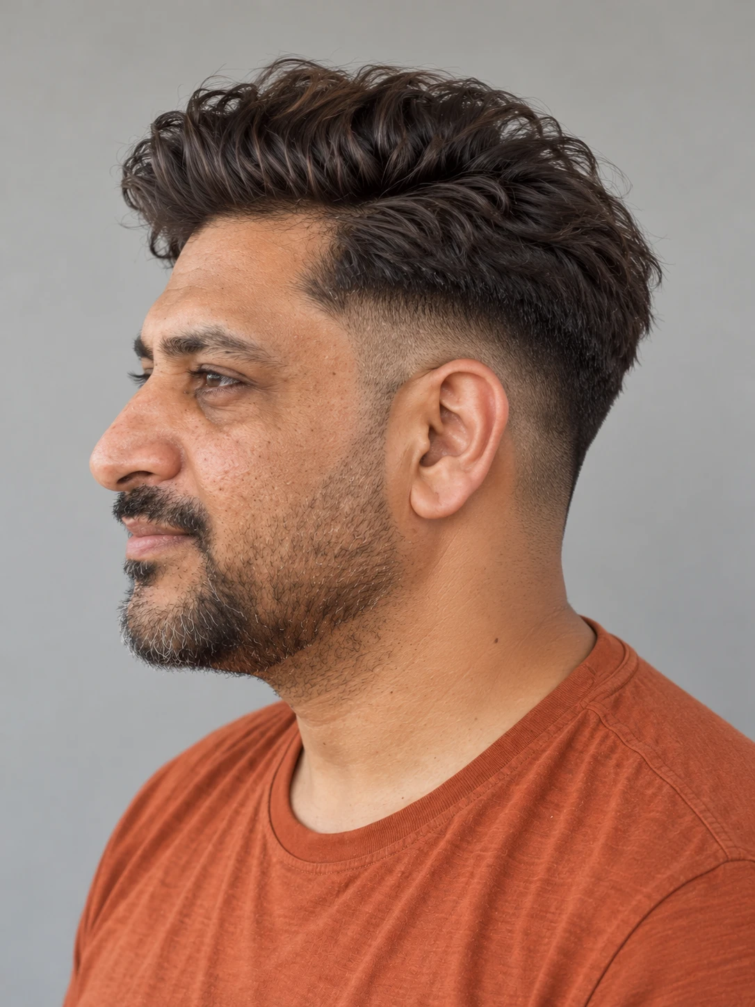 AI concept: loose wavy pompadour with a high taper, right-side angled view.
