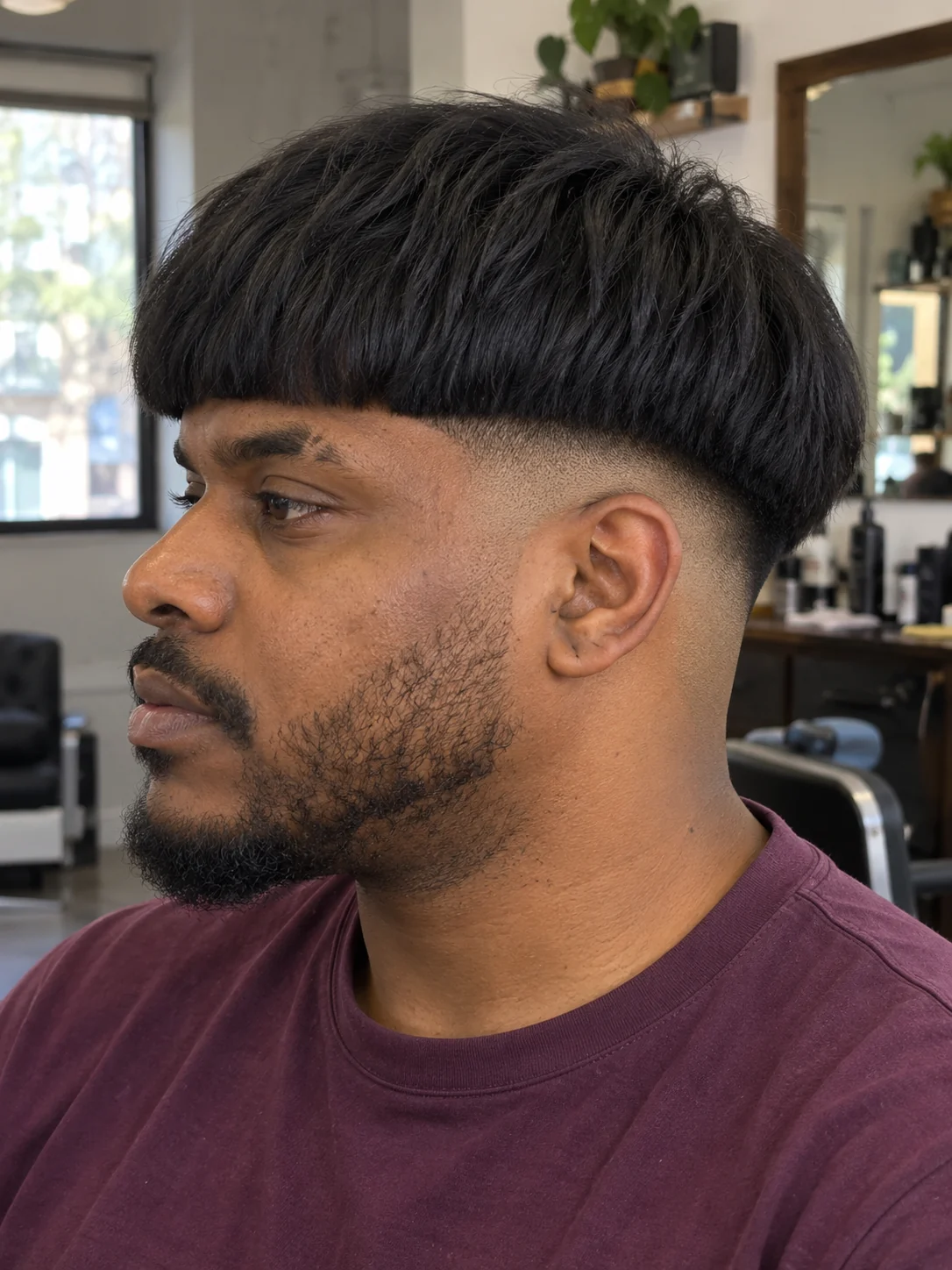AI concept: low drop fade with a heavy bowl fringe, left-side near-profile view.
